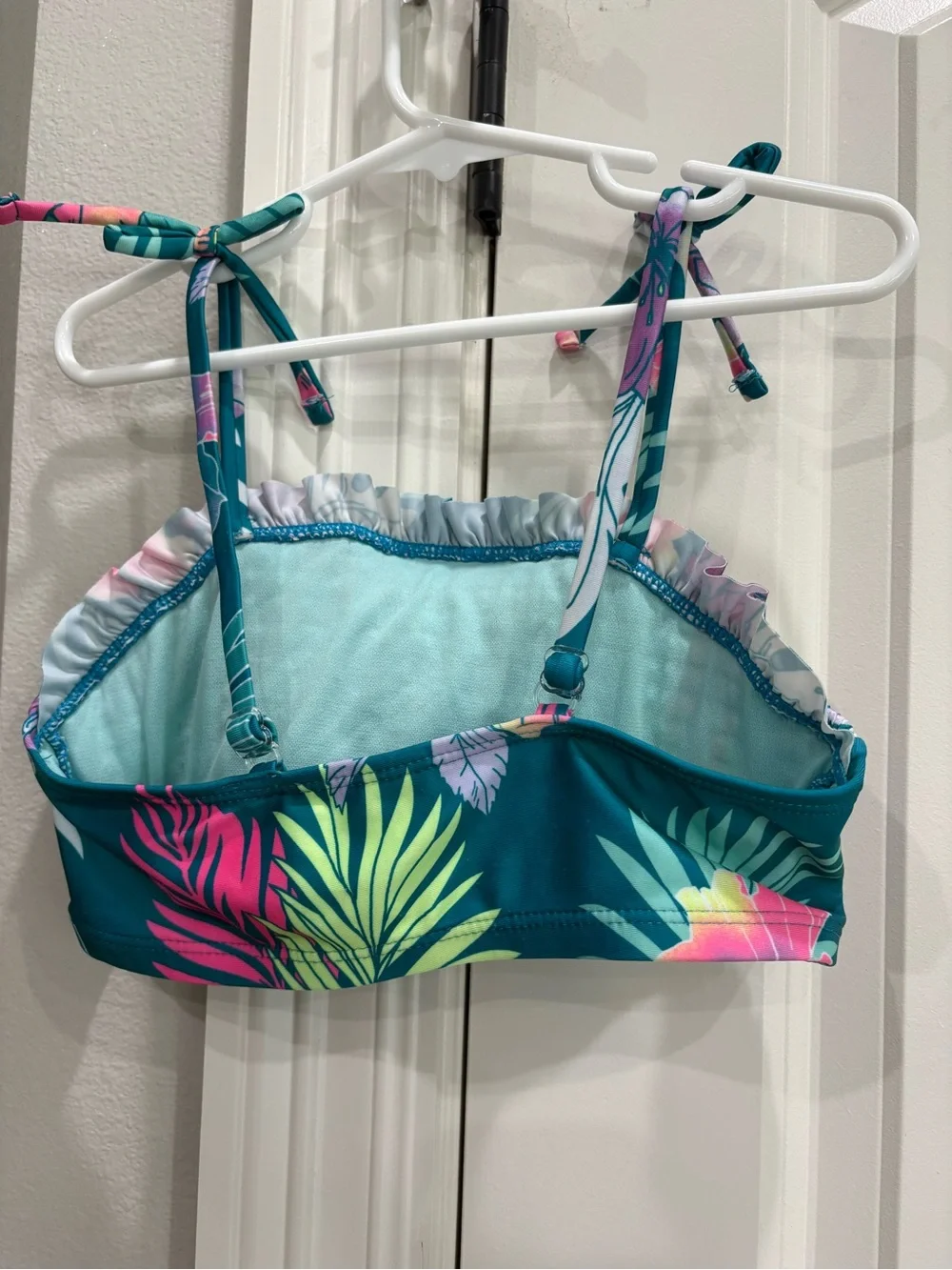 Justice green floral print bikini swimsuit top in girls size Medium 10 GUC